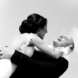 Newlywed couple laughing