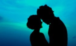 Romantic couple against a late evening backdrop