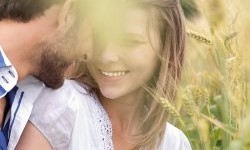 Romantic couple in field